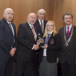 Darragh Keany, member of the judging committee; Minister for Education, Ruairi Quinn, TD; Matt Dempsey, Chairman NNI; Emily O'Grady, Colaiste Chiarain, Croom, Co. Limerick, 1st Features category; Martin Sisk, President, Irish League of Credit Unions