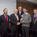Paddy Logue, member of the judging committee; Minister for Education, Ruairi Quinn, TD; Matt Dempsey, Chairman NNI; James Healy, St. Joseph's Secondary School. Tralee, Co. Kerry, 1st place News categoy; Martin Sisk, President, Irish League of Credit Unions