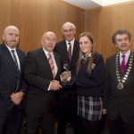 Darragh Keany, member of the judging committee; Minister for Education, Ruairi Quinn, TD; Matt Dempsey, Chairman NNI; Zoe De Gogan, Pobalscoil na Trionoide, Gaelscoil na Trionoide, Co Corcaigh, 2nd place Features category; Martin Sisk, President, Irish League of Credit Unions